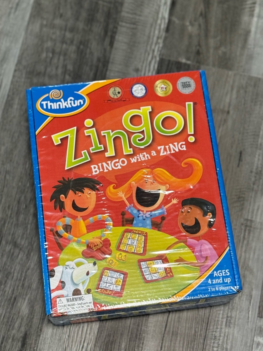 ThinkFun Zingo! Board Game (ages 4 and up)
